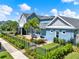 Stunning aerial view of the property highlighting the backyard patio, lush landscaping, and screened porch at 14366 Walcott Ave, Orlando, FL 32827