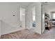 Hallway leading to the bedroom and bathroom, offering seamless transitions between living spaces at 14366 Walcott Ave, Orlando, FL 32827