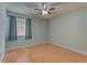 Relaxing bedroom with a ceiling fan and a window at 150 Wax Myrtle Woods Ct # 3D, Deltona, FL 32725