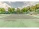 Well-maintained tennis court offers residents an opportunity for recreation and friendly competition at 150 Wax Myrtle Woods Ct # 3D, Deltona, FL 32725