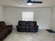 Cozy living room with comfortable seating and neutral-toned decor at 1501 Delaware Ave, St Cloud, FL 34769