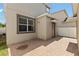 This home features a brick patio and a view of the house at 15229 Evergreen Oak Loop, Winter Garden, FL 34787