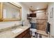 Updated bathroom featuring a tiled shower with accessibility features and a granite vanity at 1591 Pendleton St, Deltona, FL 32725