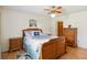Comfortable bedroom showcasing a wood bed frame and matching wooden dressers at 1591 Pendleton St, Deltona, FL 32725