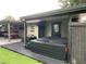 This backyard features a hot tub, patio, bar and more making it perfect for low-maintenance entertaining at 170 N Fairfax Ave, Winter Springs, FL 32708