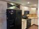 Bright eat-in kitchen features stainless steel appliances, granite countertops, painted cabinets and a window at 170 N Fairfax Ave, Winter Springs, FL 32708