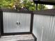 Rinse off in the convenient outdoor shower with metal walls at 170 N Fairfax Ave, Winter Springs, FL 32708