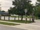 Community park featuring rope fencing, mature trees, playground, and convenient parking at 170 N Fairfax Ave, Winter Springs, FL 32708