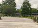 Picturesque community park featuring a serene lake, wooden rope fencing, and lush greenery at 170 N Fairfax Ave, Winter Springs, FL 32708