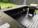 Outdoor wet bar with grill provides a convenient outdoor dining experience at 170 N Fairfax Ave, Winter Springs, FL 32708
