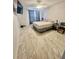 Bright bedroom with a ceiling fan, window, neutral walls, and tiled floors at 1815 Townhall Ln # 1815, Orlando, FL 32807