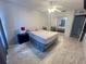 Bright bedroom showcasing tile flooring and a mirrored closet at 1815 Townhall Ln # 1815, Orlando, FL 32807