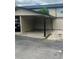 Attached carport with space for parking, providing convenient covered access to the home at 1815 Townhall Ln # 1815, Orlando, FL 32807
