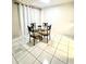The dining area has tile floors, and seating for four at 1815 Townhall Ln # 1815, Orlando, FL 32807
