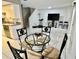Open concept with a view of the living room from the dining area at 1815 Townhall Ln # 1815, Orlando, FL 32807