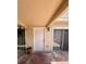 Inviting front door with neutral tones and a covered entrance on a brick entryway at 1815 Townhall Ln # 1815, Orlando, FL 32807