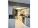 A kitchen showcasing stainless steel appliances and a convenient pantry space at 1815 Townhall Ln # 1815, Orlando, FL 32807