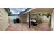 Brick paver patio with grill, offering an inviting outdoor space for cooking and dining at 1815 Townhall Ln # 1815, Orlando, FL 32807