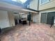 Brick paver patio with grill, and direct access to the house, perfect for easy indoor/outdoor entertaining at 1815 Townhall Ln # 1815, Orlando, FL 32807