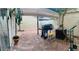 Private patio with brick pavers, grill, and outdoor amenities, perfect for entertaining and relaxation at 1815 Townhall Ln # 1815, Orlando, FL 32807