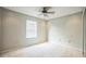 Bedroom featuring carpet, a ceiling fan, recessed lights, and a window at 1840 Orange View Ct, Kissimmee, FL 34746