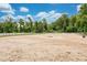 A large equestrian field with a white fence, offering ample space for riding and training at 2142 Woodbridge Rd, Longwood, FL 32779
