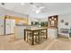 Bright kitchen open to dining area, perfect for entertaining guests and Gathering dinners at 2142 Woodbridge Rd, Longwood, FL 32779