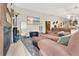 Relaxing living area with a fireplace and entertainment center at 2142 Woodbridge Rd, Longwood, FL 32779