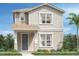 Charming two-story home featuring a neutral color palette, double-pane windows, and a covered front porch at 2583 Long Pine Ave, Apopka, FL 32712