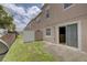 This townhouse has a small backyard and sliding glass door at 2901 Ashford Park Pl, Oviedo, FL 32765