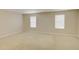 Spacious bedroom with neutral carpet, light walls, and two windows allowing ample natural light at 2901 Ashford Park Pl, Oviedo, FL 32765