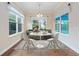 Cozy breakfast nook with bright windows, and neutral decor at 2922 Reef Knot Pl, Winter Park, FL 32792