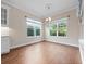 Bright dining room area with hardwood floors and natural light at 2922 Reef Knot Pl, Winter Park, FL 32792
