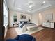 Serene main bedroom with tray ceilings, accent lighting, and plush carpeting at 2922 Reef Knot Pl, Winter Park, FL 32792