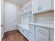 Functional mudroom featuring custom built-in cabinets and storage, offering organization and convenience at 2922 Reef Knot Pl, Winter Park, FL 32792