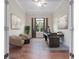 Stylish home office with hardwood floors, neutral decor, and ample natural light at 2922 Reef Knot Pl, Winter Park, FL 32792