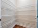 Walk-in pantry with wire shelving for ample storage at 2922 Reef Knot Pl, Winter Park, FL 32792