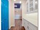 Pantry door leading into dining area with built in cabinets and countertop space at 2922 Reef Knot Pl, Winter Park, FL 32792
