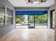 This covered patio has views of the pool, the spa, and the backyard at 2922 Reef Knot Pl, Winter Park, FL 32792