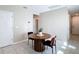 Dining area near the entry and living space, bathed in natural light at 29783 Anahid Dr, Leesburg, FL 34748