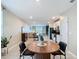 Bright dining area open to the kitchen and living spaces at 29783 Anahid Dr, Leesburg, FL 34748