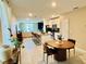 Open-concept layout combining the kitchen, dining area, and living room creating an inviting atmosphere at 29783 Anahid Dr, Leesburg, FL 34748