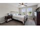 Inviting bedroom with carpeted floors, two large windows, and a cozy bed setup at 3172 Jade Tree Pt, Oviedo, FL 32765