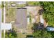 Aerial view of the home's backyard, showcasing ample space and additional outdoor structures at 325 Little Aspen Ct, Ocoee, FL 34761