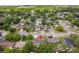 Aerial view of the property in a residential neighborhood, showing the home's layout and surroundings at 325 Little Aspen Ct, Ocoee, FL 34761