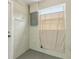 Basement laundry area with a window, neutral paint, and concrete flooring at 325 Little Aspen Ct, Ocoee, FL 34761