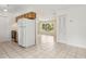 Open kitchen design showcasing a white refrigerator and a view into the living area at 325 Little Aspen Ct, Ocoee, FL 34761
