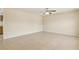 Large living area showcasing tile flooring and ample space for furnishings and decor at 325 Little Aspen Ct, Ocoee, FL 34761