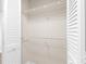 Spacious closet featuring white shelving and paneled doors, providing ample storage at 4312 Lake Underhill Rd # 19-B, Orlando, FL 32803