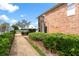 Exterior building with greenery and easy access to outdoor walkways at 4312 Lake Underhill Rd # 19-B, Orlando, FL 32803